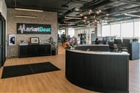 Inside MarketBeat’s new downtown headquarters, luxe office meets high-end home vibe
